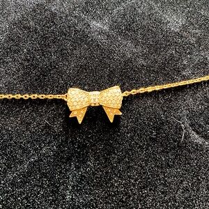 Juicy couture gold tone bow rhinestone bracelet new with tags